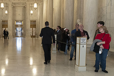Look for the “Courtroom Lecture Line Forms Here” sign in the Great Hall.