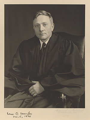 Formal photograph of Justice William O. Douglas dressed in his judicial robe at the time of his appointment to the Supreme Court in 1939.