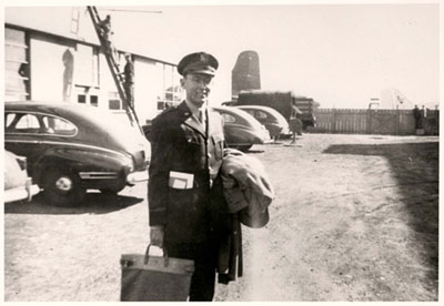 Lewis F. Powell, Jr. at National Airport in early 1944, holding top secret information for General Eisenhower.