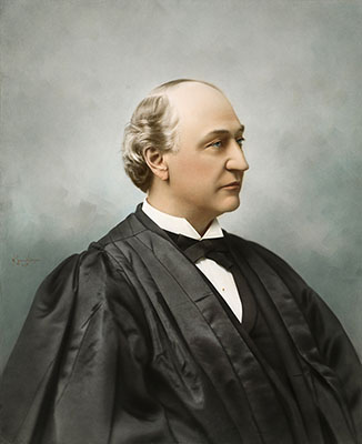Hand-painted portrait photograph of Justice David J. Brewer in his robe, taken in 1897.