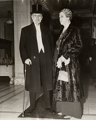 Justice George Sutherland and his wife, Rose Sutherland, leaving their home for dinner at the White House on January 20, 1938. 