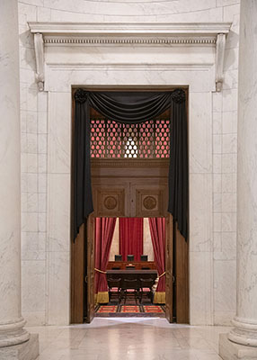 The Courtroom doors draped following the death of Retired Associate Justice Sandra Day O’Connor, December 1, 2023.