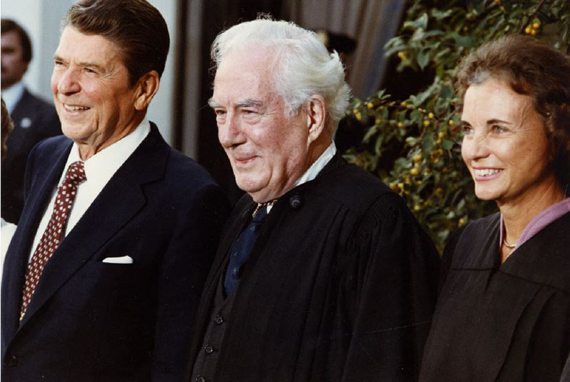 Justice Sandra Day O'Connor with Chief Justice Warren E. Burger and President Ronald Reagan on the day of Justice O'Connor's Investiture, September 25, 1981.