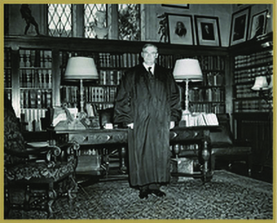 Stone standing in his home office, October 4, 1941.
