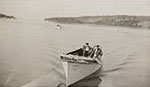 Stone and friend William P. Turner ride in motorboat Sabrina